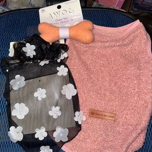 Pink Dog Sweater and Black Floral Dog Dress and dog bone toy